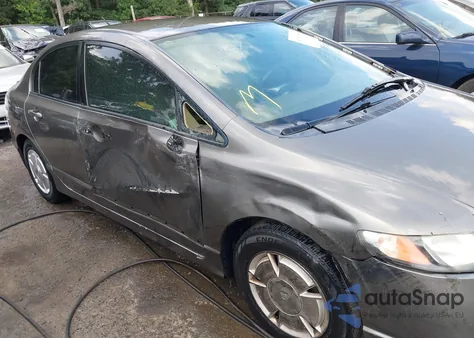2007 Honda Civic Hybrid from USA, damaged, VIN JHMFA362X7S031612